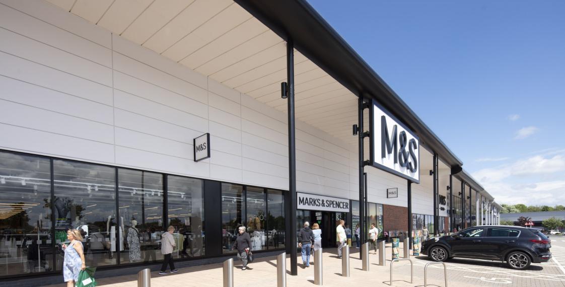 Entrance to Marks & Spencer at The Galleries in Washington, featuring branding and clean architectural design.